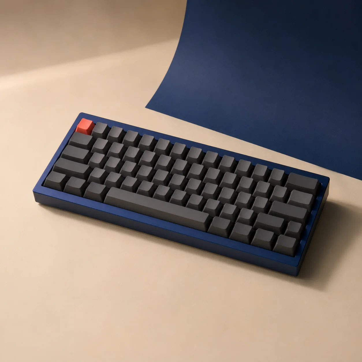 Cobalt Aster 65 mechanical keyboard on an ivory surface