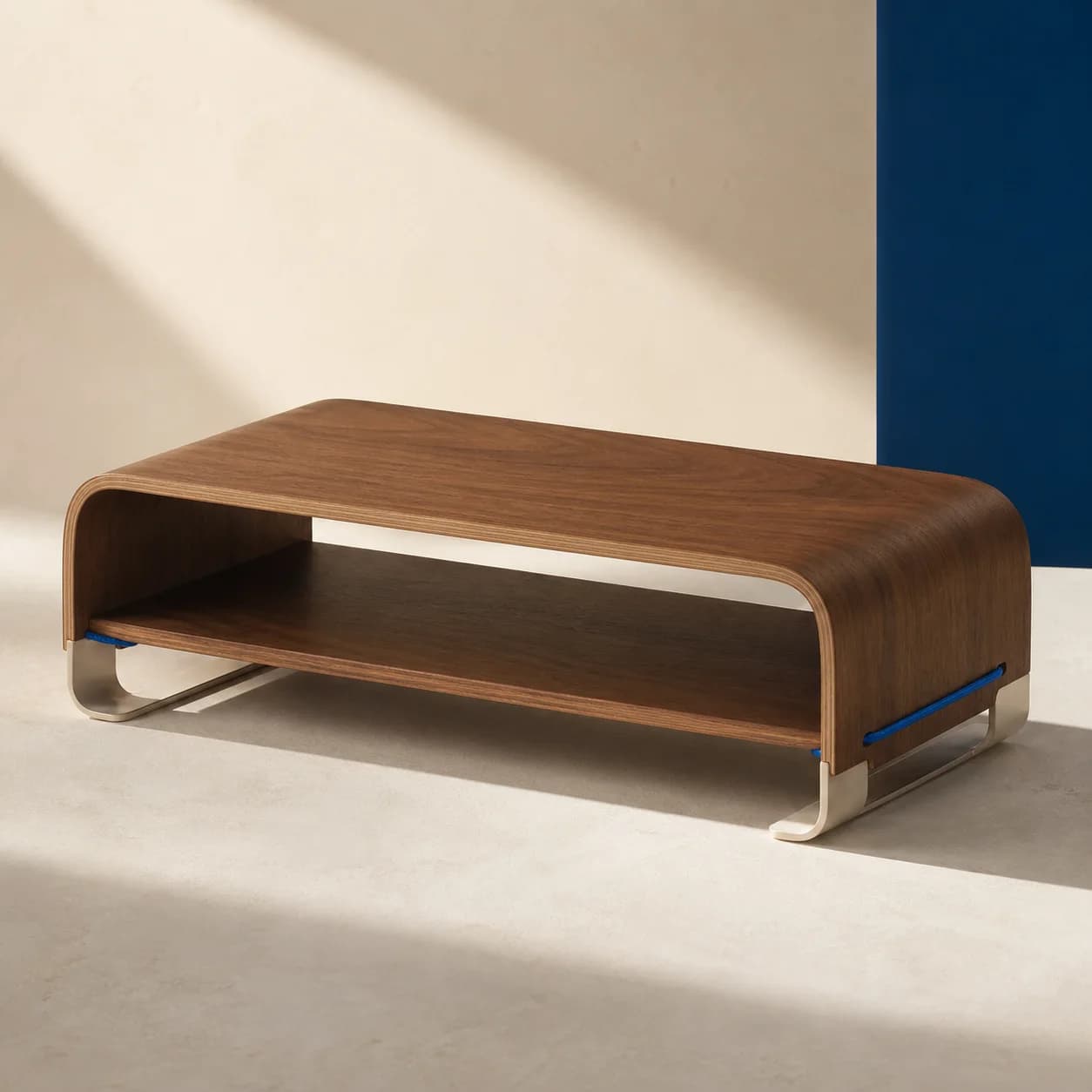 Walnut Field monitor riser on an ivory desk